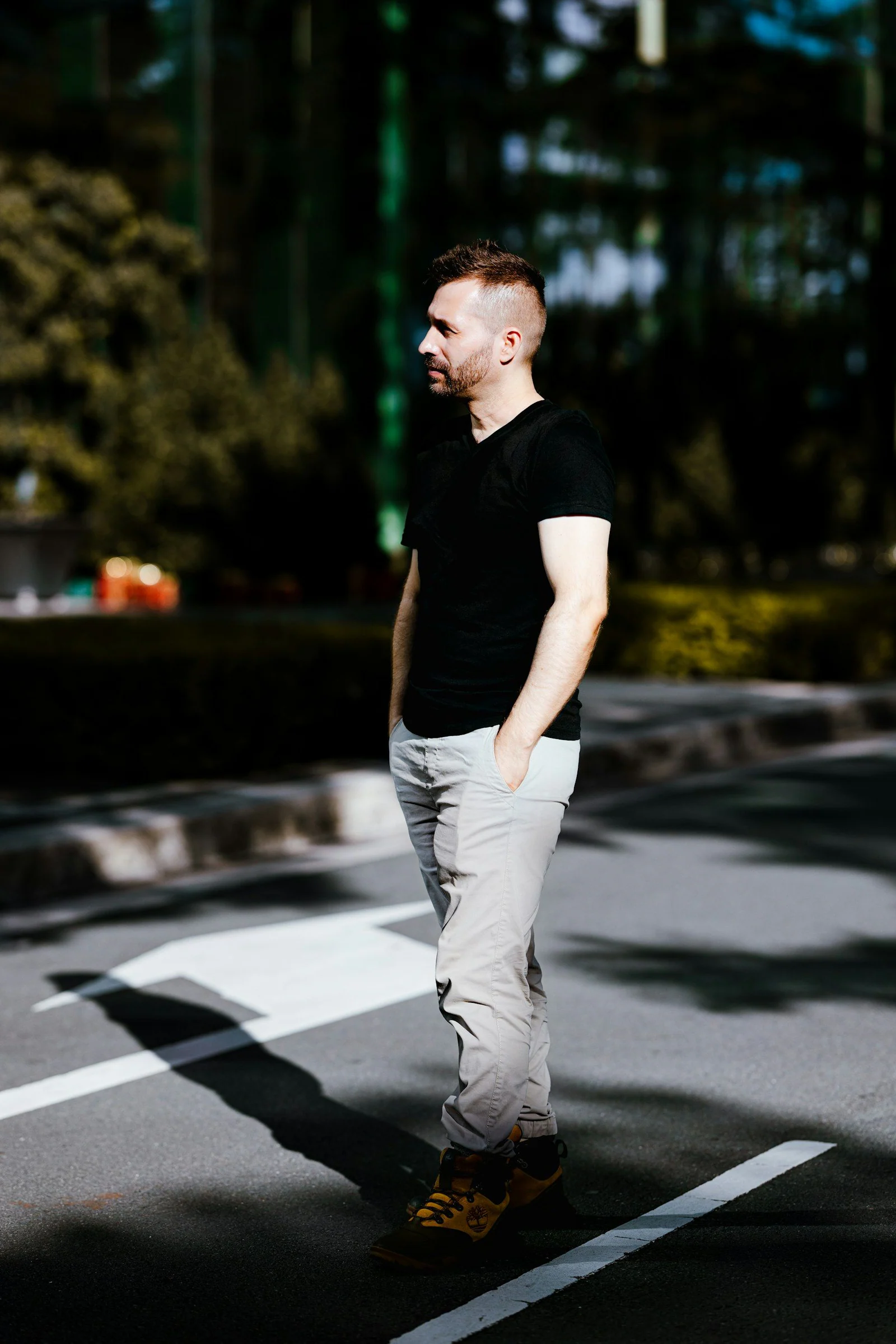 A man standing in a parking lot