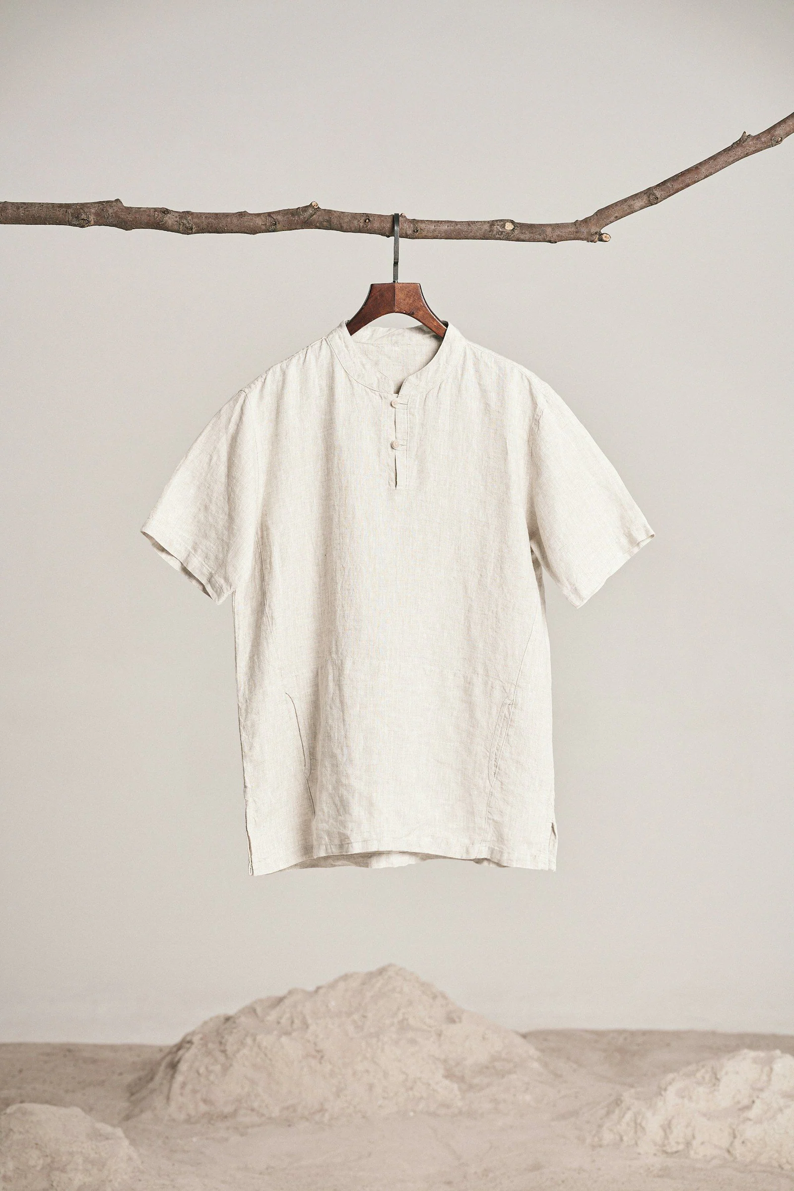 A white shirt hanging on a clothes line