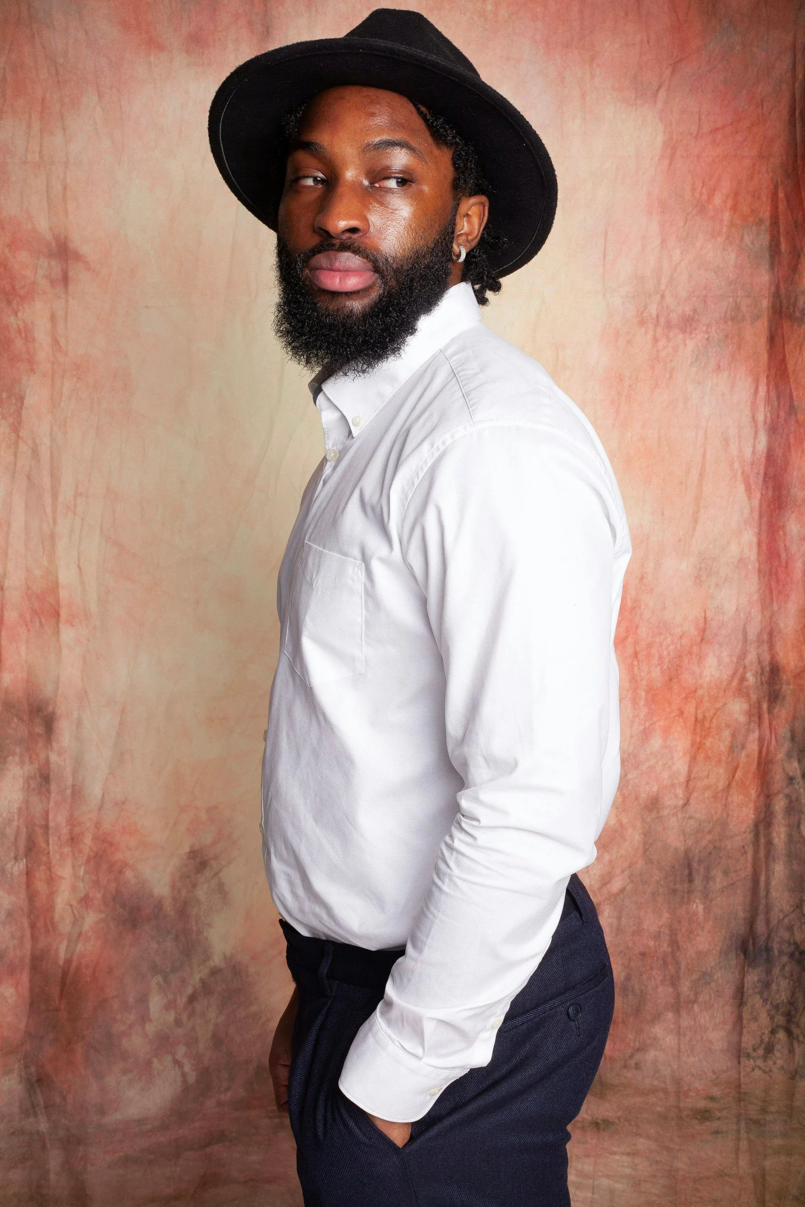 A man with a beard wearing a hat