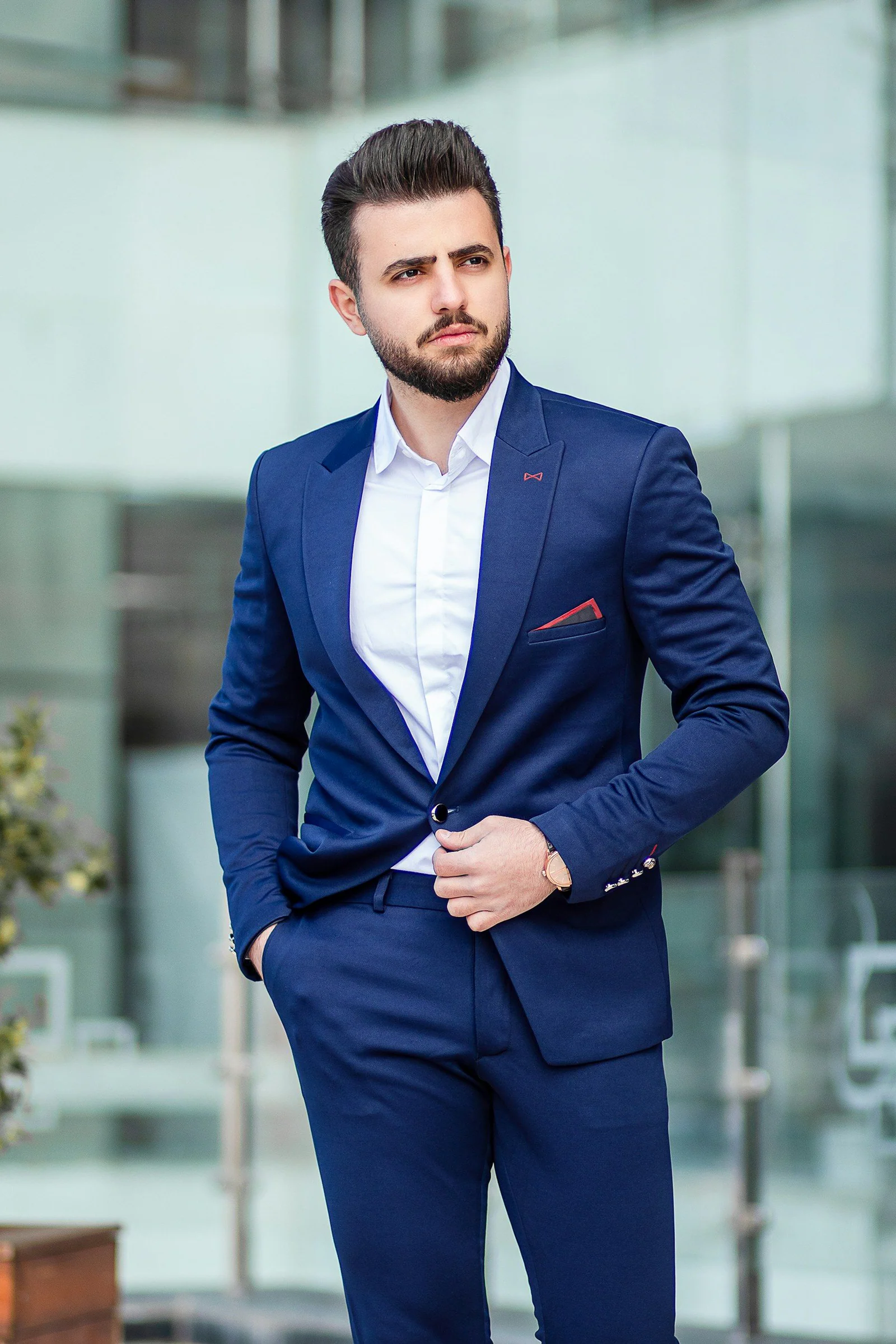 Man in blue suit standing