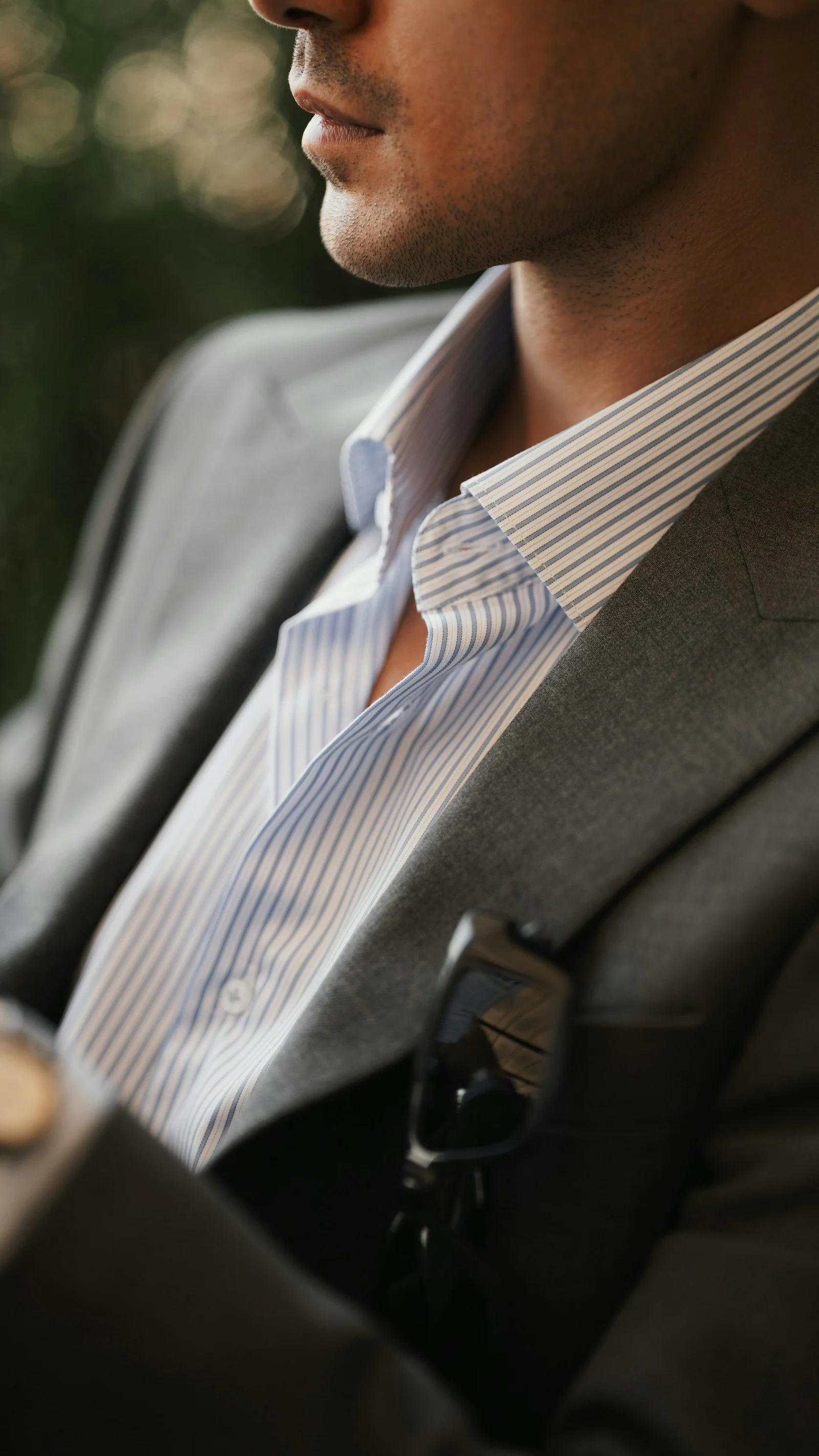 Man in grey blazer and shirt