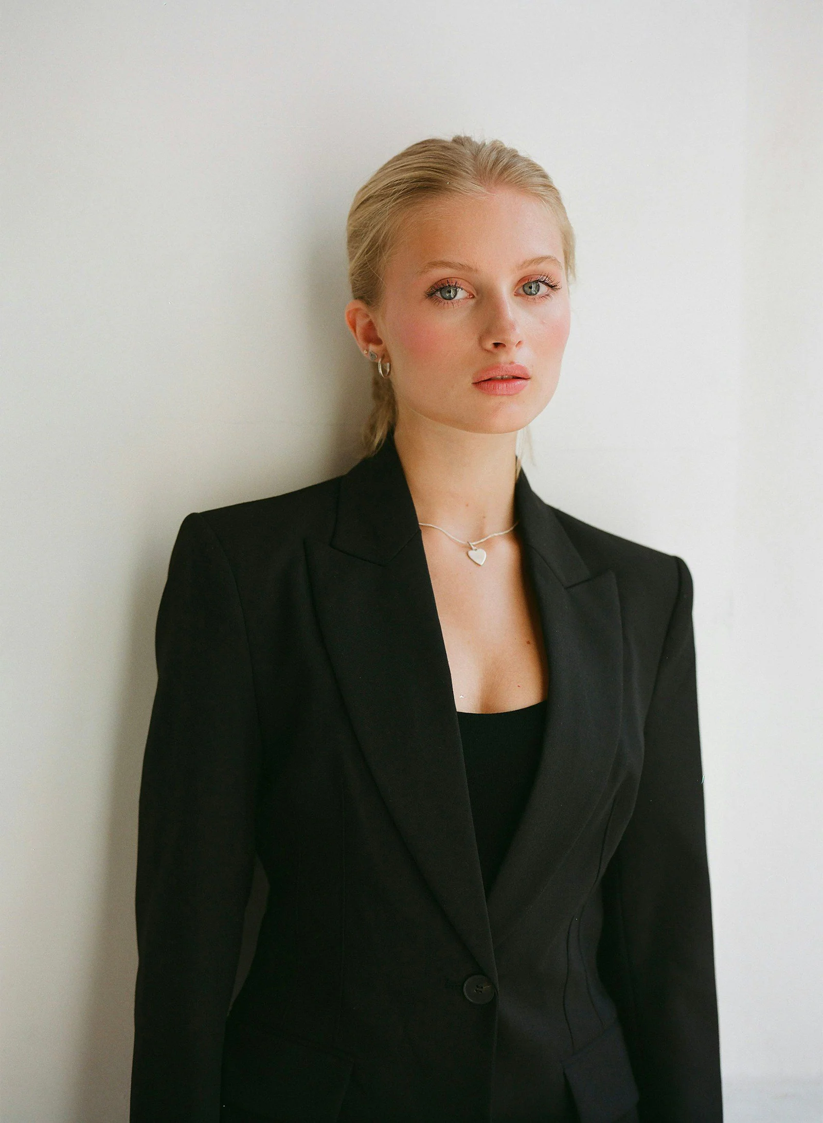 Woman in a black tailored blazer
